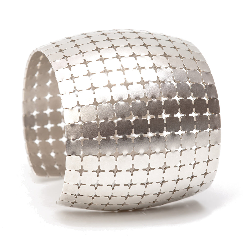 Maria Samora creates a Sterling Silver Starlight Cuff for the Heard Museum 2018.